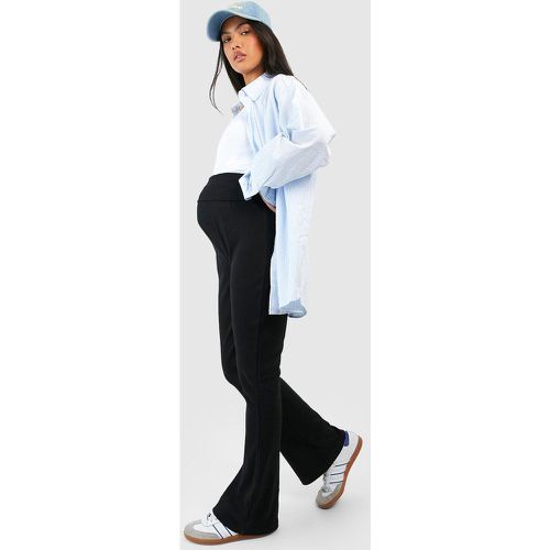 Pantaloni da yoga Premaman in cotone a coste - boohoo - Modalova