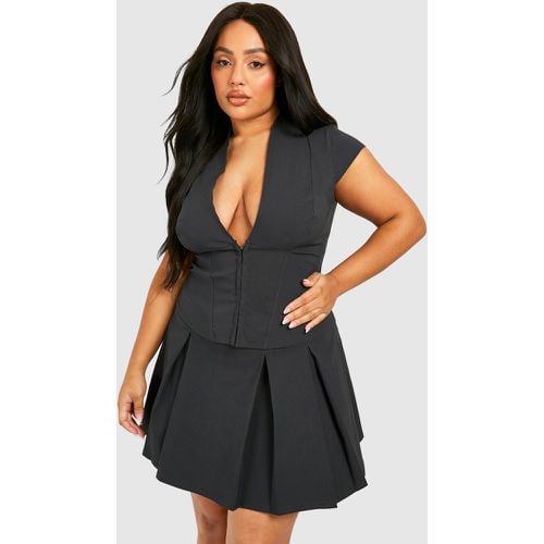 Top a corsetto Plus Size con maniche ad aletta e asole - boohoo - Modalova