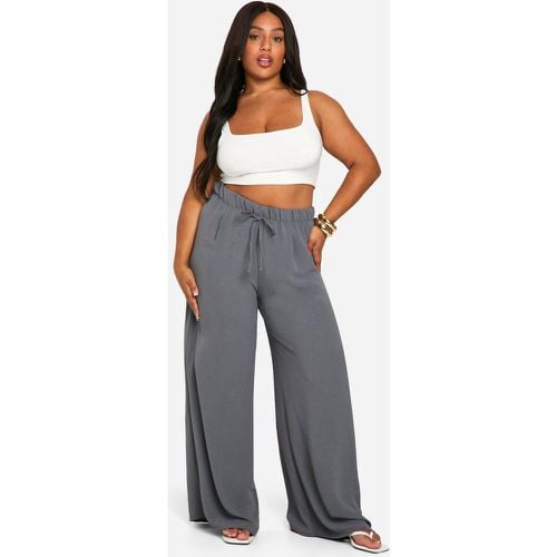 Pantaloni Plus Size a gamba ampia con laccetti intessuti - boohoo - Modalova