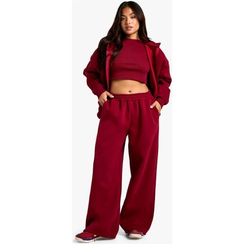 Tuta sportiva Petite in 3 pezzi con pantaloni tuta dritti - boohoo - Modalova