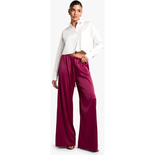 Pantaloni a gamba ampia in raso con coulisse in vita - boohoo - Modalova