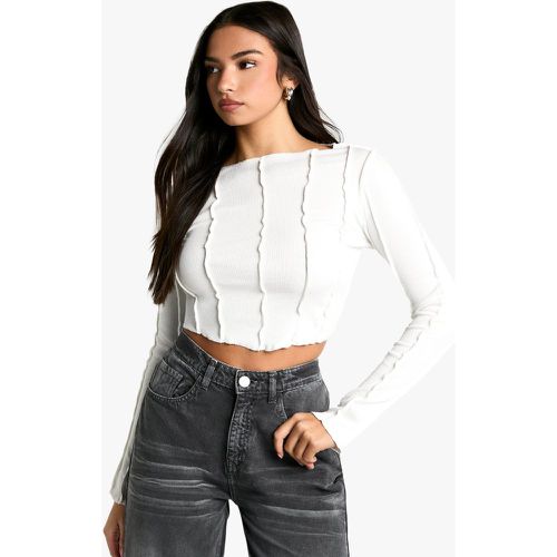 Top a maniche lunghe con cuciture esposte - boohoo - Modalova