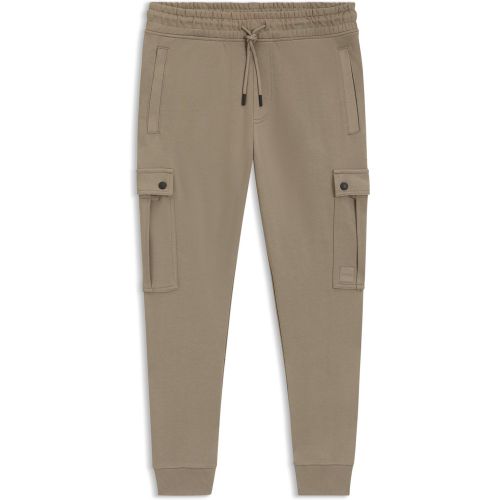 Bas de survêtement Relaxed en molleton de coton avec poches cargo - Boss - Modalova