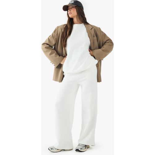 Pantaloni tuta dritti con ricamo Dsgn Studio - boohoo - Modalova