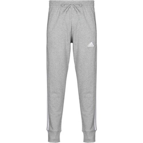 Trainingsanzüge Essentials French Terry Tapered Cuff 3-Stripes Joggers - Adidas - Modalova