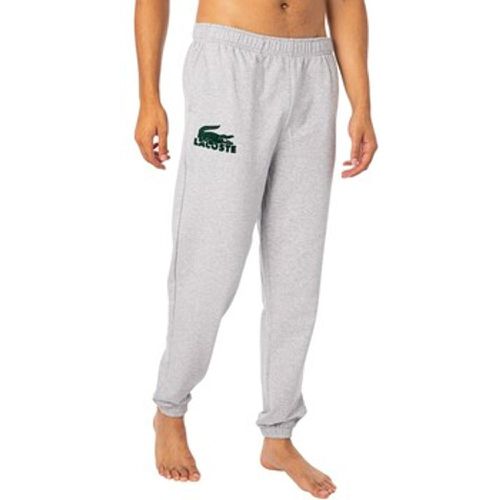 Pyjamas/ Nachthemden Lounge-Jogginghose mit strukturiertem Logo - Lacoste - Modalova