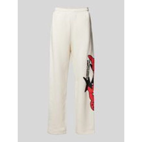 Flared Sweatpants mit Label-Motiv-Print Modell 'ASTRO' - Fashion24 DE - Modalova