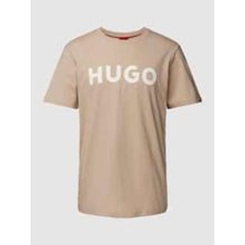 T-Shirt mit Motiv-Print und Logo-Print sowie Regular Fit - HUGO - Modalova