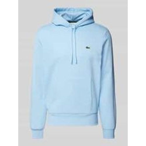 Regular Fit Hoodie mit Baumwolle - Lacoste - Modalova