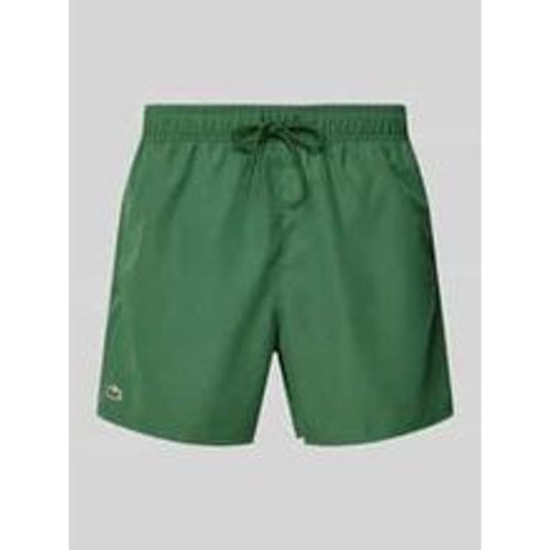 Regular Fit Badeshorts mit Logo-Badge - Lacoste - Modalova