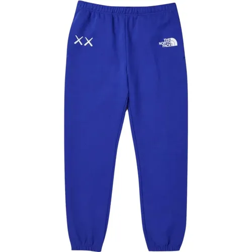 Blaue Joggerhose Limited Edition , Herren, Größe: S - Kaws - Modalova