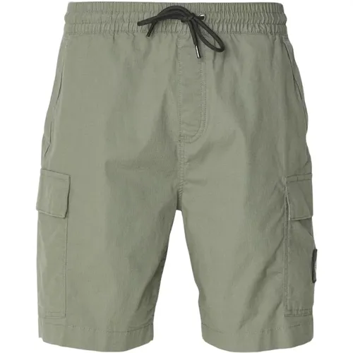 Grüne Gewaschene Cargo Shorts , Herren, Größe: L - Calvin Klein - Modalova
