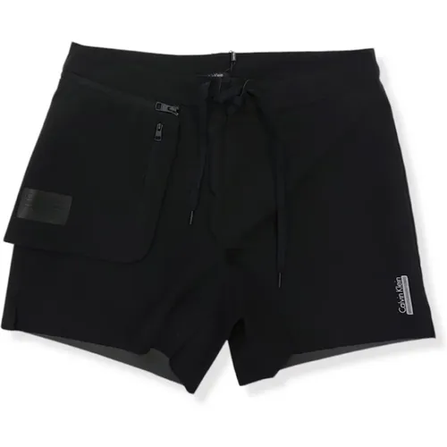 Stylish Men`s Swim Shorts with Removable Pocket , male, Sizes: M - Calvin Klein - Modalova