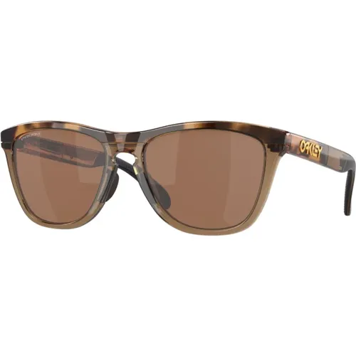 Sportliche Sonnenbrille mit leichten Rahmen und polarisierten Gläsern - Oakley - Modalova