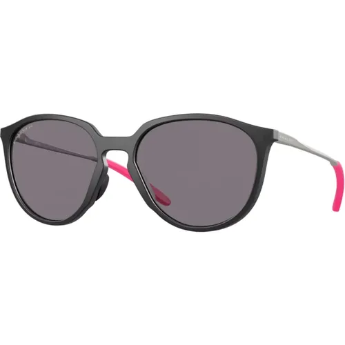 Sport-Sonnenbrille mit polarisierten Gläsern , Damen, Größe: 57 MM - Oakley - Modalova