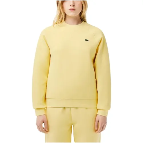 Gelber Regular Fit Sweatshirt , Damen, Größe: XS - Lacoste - Modalova