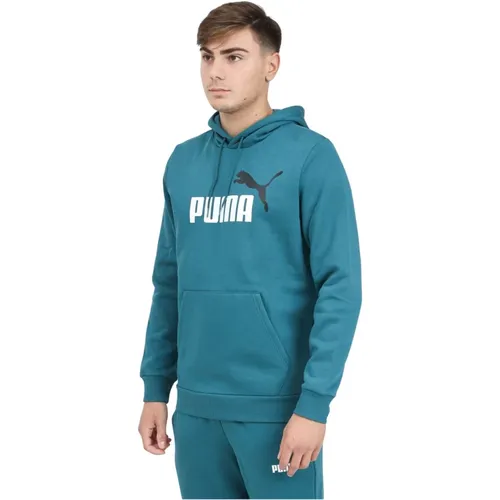 Grüner Hoodie Essentials+ Herbst Winter , Herren, Größe: L - Puma - Modalova