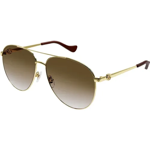 Gold/Braun getönte Sonnenbrille - Gucci - Modalova