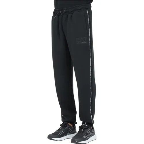 Schwarze Sportliche Hose mit Seitenstreifen - Emporio Armani EA7 - Modalova