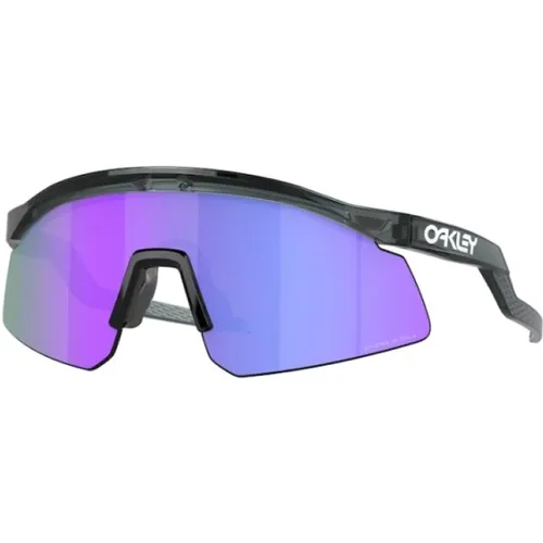 Sportliche Sonnenbrille,Sunglasses,Sportliche Sonnenbrille mit polarisierten Gläsern - Oakley - Modalova