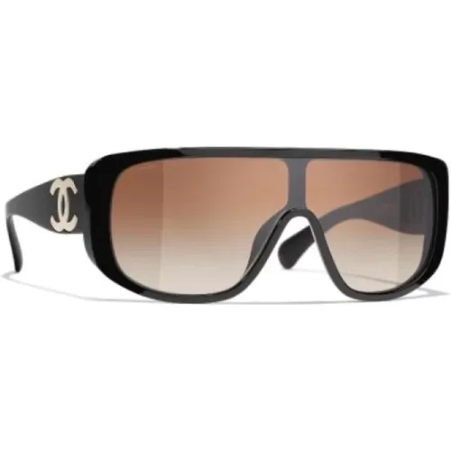 Elegante schwarze Sonnenbrille mit braunen Gläsern - Chanel - Modalova
