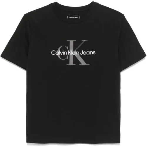 Schwarze T-Shirts und Polos , Damen, Größe: S - Calvin Klein Jeans - Modalova