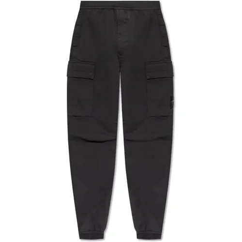 Trousers with logo , male, Sizes: W32, W29 - Stone Island - Modalova