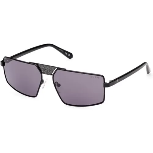 Glänzende schwarze Sonnenbrille mit violetten Gläsern , unisex, Größe: 60 MM - Guess - Modalova