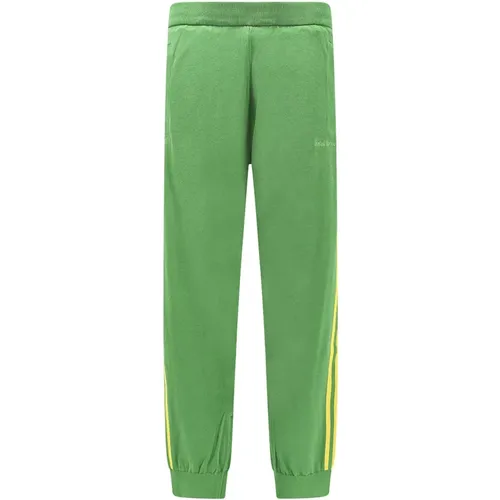 Grüne Hose mit Reißverschlusstaschen , Herren, Größe: M - Adidas - Modalova