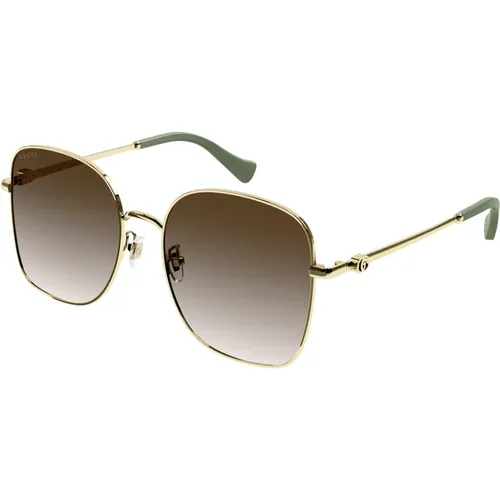 Gold/Braun getönte Sonnenbrille , Damen, Größe: 59 MM - Gucci - Modalova