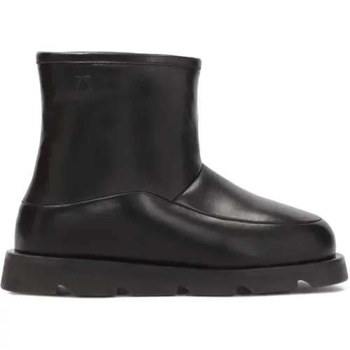 Minimalistische schwarze isolierte Schneestiefel - Kazar Studio - Modalova