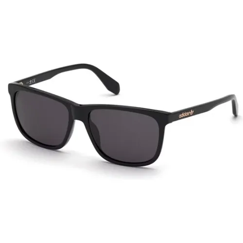 Schwarze Glänzende Sonnenbrille , unisex, Größe: 58 MM - adidas Originals - Modalova