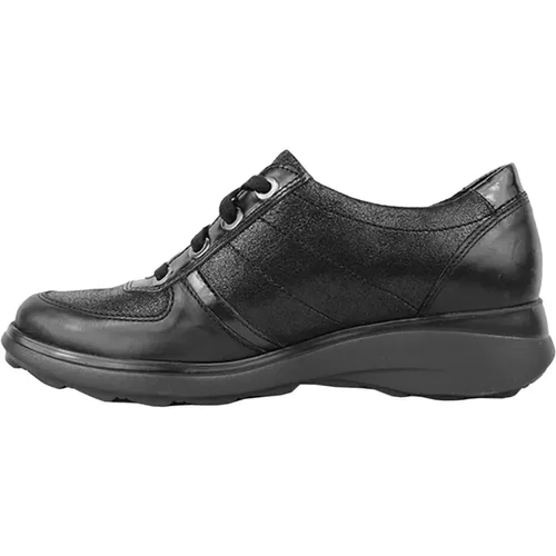 Damen-Sneaker aus schwarzem Leder - mephisto - Modalova
