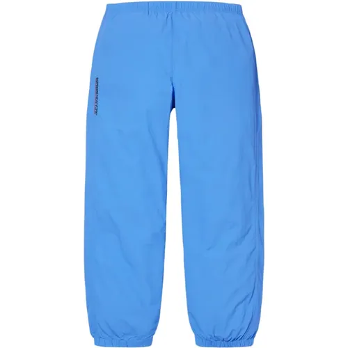 Blaue wasserabweisende Nylon-Warm-Up-Hose , Herren, Größe: L - Supreme - Modalova