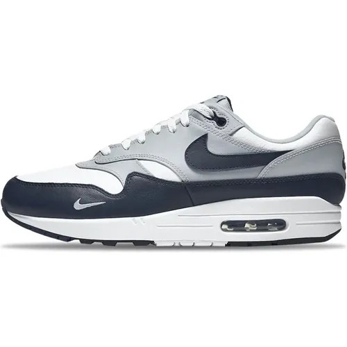 Graue Leder Air Max 1 LV8 , Herren, Größe: 38 1/2 EU - Nike - Modalova