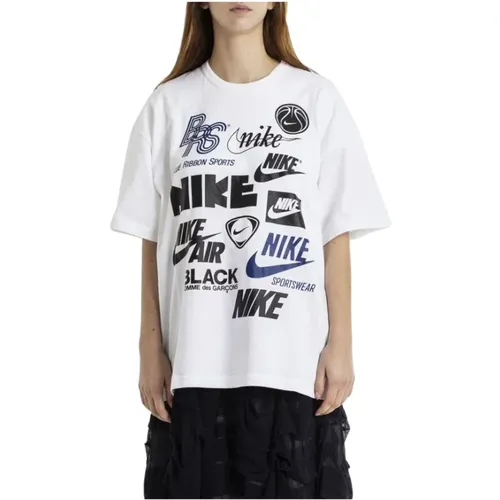 Schwarzes x Nike T-Shirt mit Drucken - Comme des Garçons - Modalova