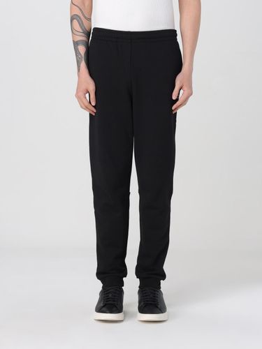 Pants LACOSTE Men color Black - Lacoste - Modalova