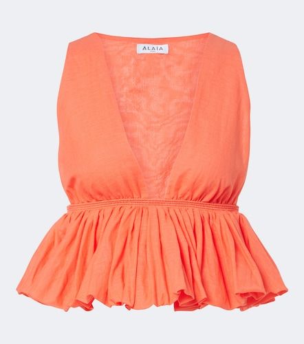 Alaïa Top peplum en mezcla de algodón y lino a rayas - Alaia - Modalova