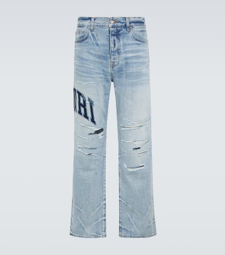 Jeans regular distressed con logo - Amiri - Modalova