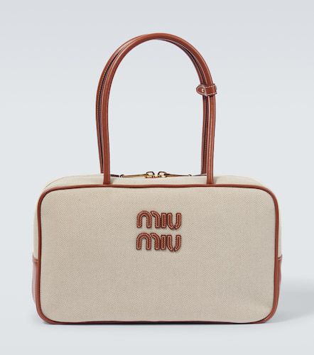 Logo leather-trimmed canvas tote bag - Miu Miu - Modalova