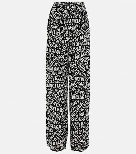Pantaloni a gamba larga con logo - Balenciaga - Modalova