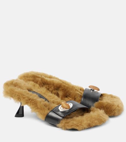 Mules Turnlock con shearling - Christopher Esber - Modalova