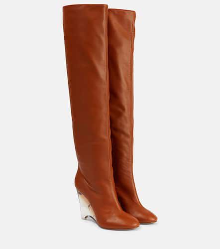 AlaÃ¯a Leather knee-high boots - Alaia - Modalova