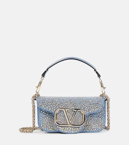 Locò Small embellished denim shoulder bag - Valentino Garavani - Modalova