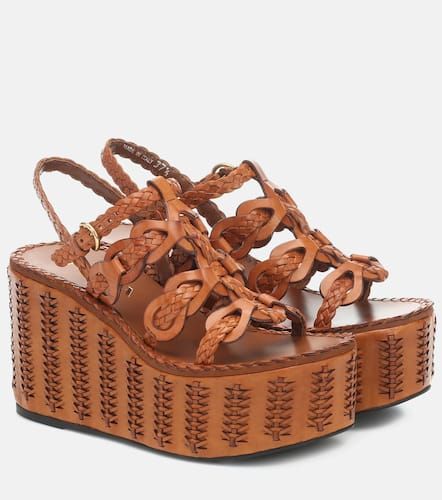 Prada Plateausandalen aus Leder - Prada - Modalova