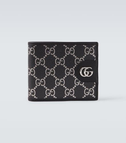 Cartera plegable con piel y GG - Gucci - Modalova