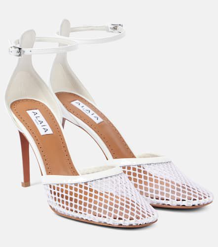 AlaÃ¯a Leather-trimmed mesh pumps - Alaia - Modalova