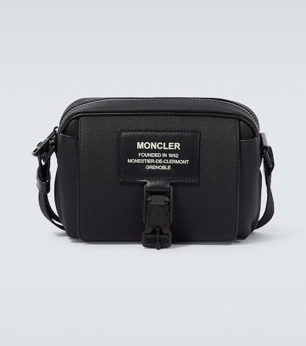 Nakoa leather-trimmed crossbody bag - Moncler - Modalova