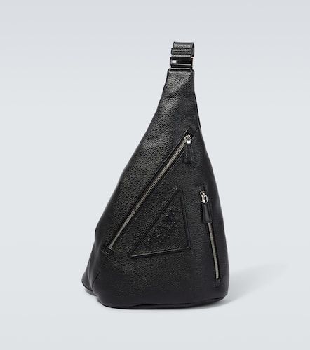 Cross embossed logo leather backpack - Prada - Modalova