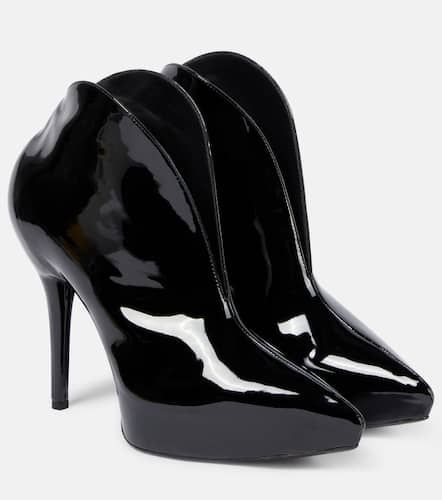 Alaïa Bottines Booties Slick en cuir verni - Alaia - Modalova